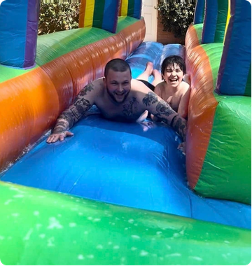 Local event with inflatable water slide