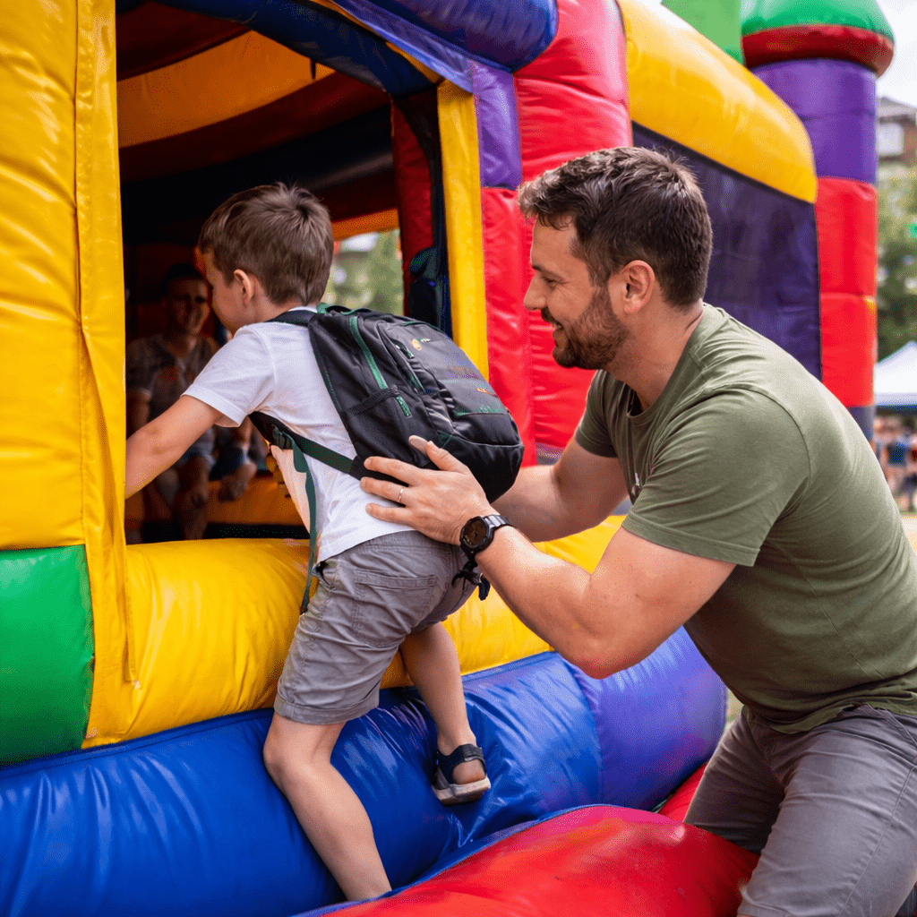 Father and son at the bouncy castle